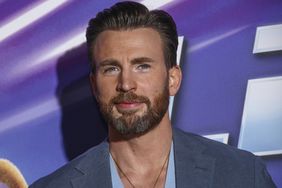 Chris Evans poses for photographers upon arrival for the premiere of the film 'Lightyear'