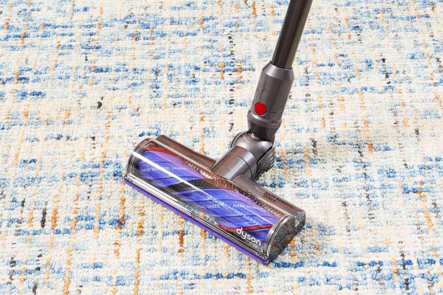 Dyson V12 Detect Slim cleaning a rug