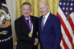 U.S. President Joe Biden awards singer Bruce Springsteen a 2021 National Medal of Art during a ceremony