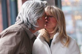 Kurt Russell and Goldie Hawn Share a Kiss in Aspen