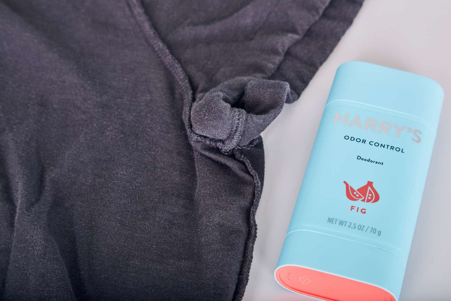Harry's Odor & Enhanced Sweat Control, Extra-Strength Antiperspirant displayed next to an inside out black T-shirt