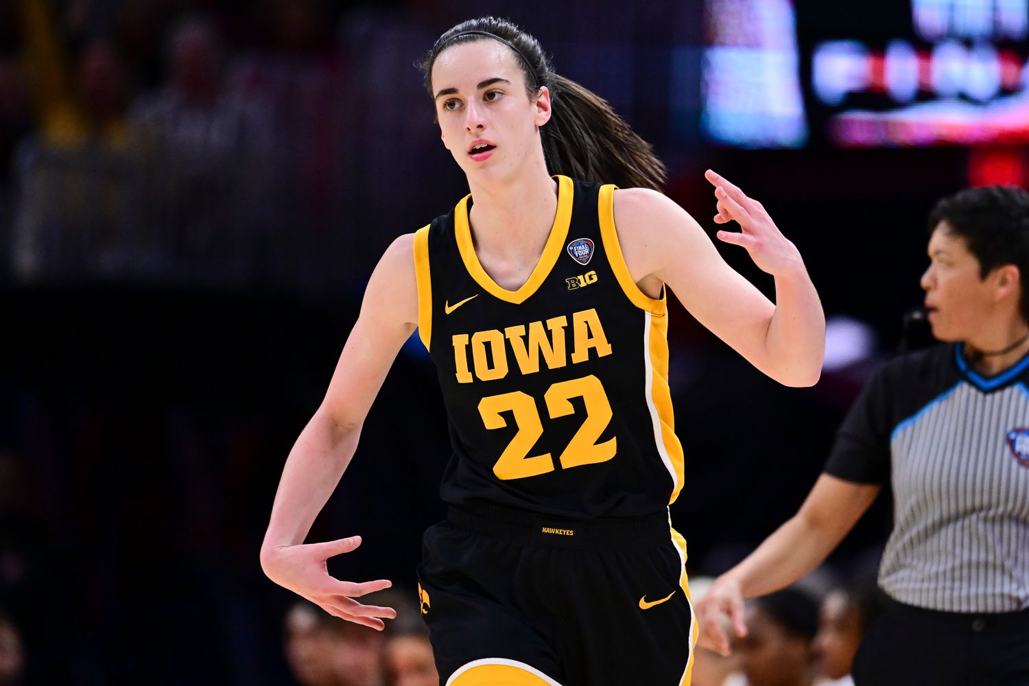 Caitlin Clark #22 of the Iowa Hawkeyes celebrates a three pointer against the South Carolina Gamecocks during the NCAA Women's Basketball Tournament National Championship at Rocket Mortgage Fieldhouse on April 7, 2024 in Cleveland, Ohio.