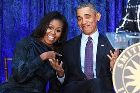 Former First Lady Michelle Obama and former President Barack Obama are seen after their portraits were unveiled at the Smithsonian National Portrait Gallery on Monday February 12, 2018 in Washington, DC.