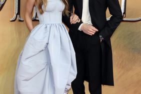 Eddie Redmayne and Hannah Bagshawe attend the "Fantastic Beasts: The Secrets of Dumbledore" world premiere at The Royal Festival Hall on March 29, 2022 in London, England