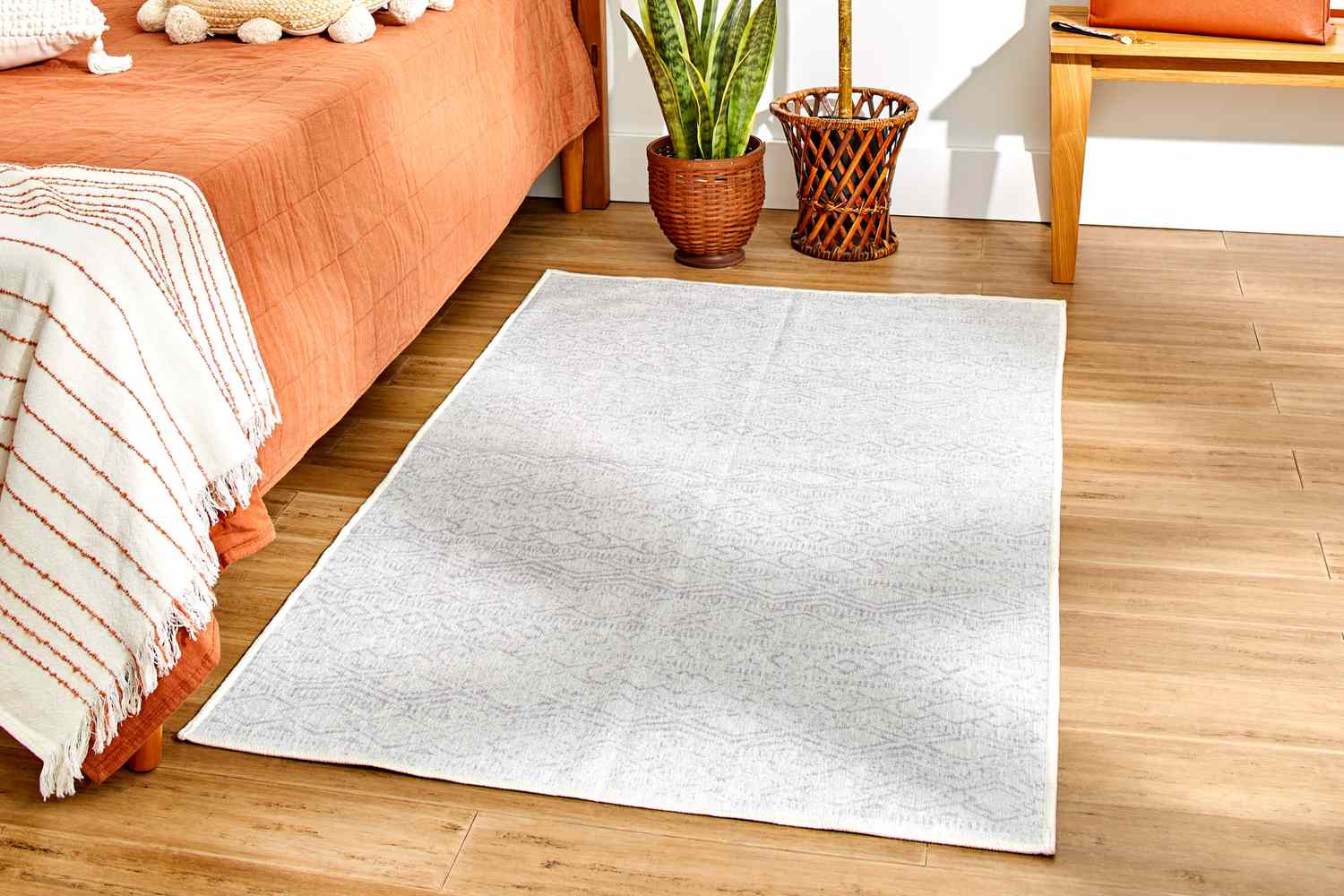 The Tumble Tabor Washable Rug & Cushioned Rug Pad in a bedroom setting