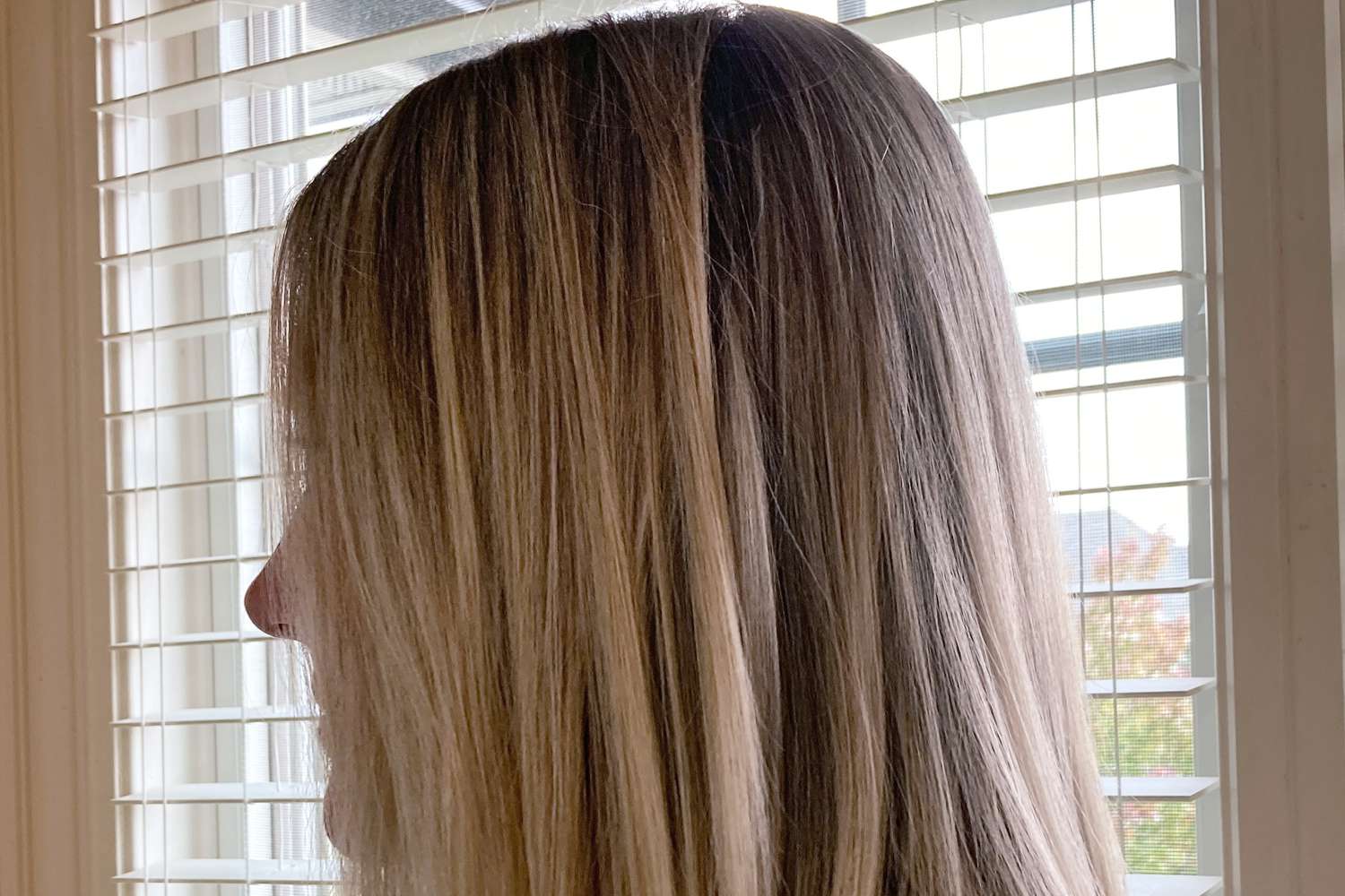 A person's hair after using Saltair Beach Blonde Shampoo