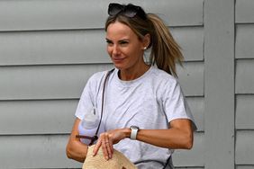 Erica Stoll ditches her flashy engagement ring as she breaks cover the day after his shock divorce filing is 
