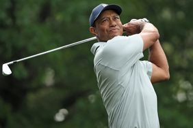 Tiger Woods of the United States plays his shot from the fourth tee during a practice round prior to the 2023 Masters Tournament at Augusta National Golf Club on April 04, 2023 in Augusta, Georgia