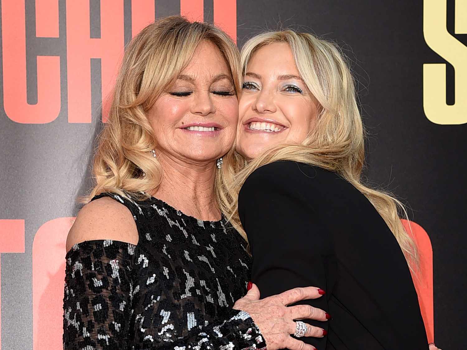 Goldie Hawn (L) and her daughter Kate Hudson arrive at the premiere of 20th Century Fox's "Snatched" at the Village Theatre on May 10, 2017 in Los Angeles, California