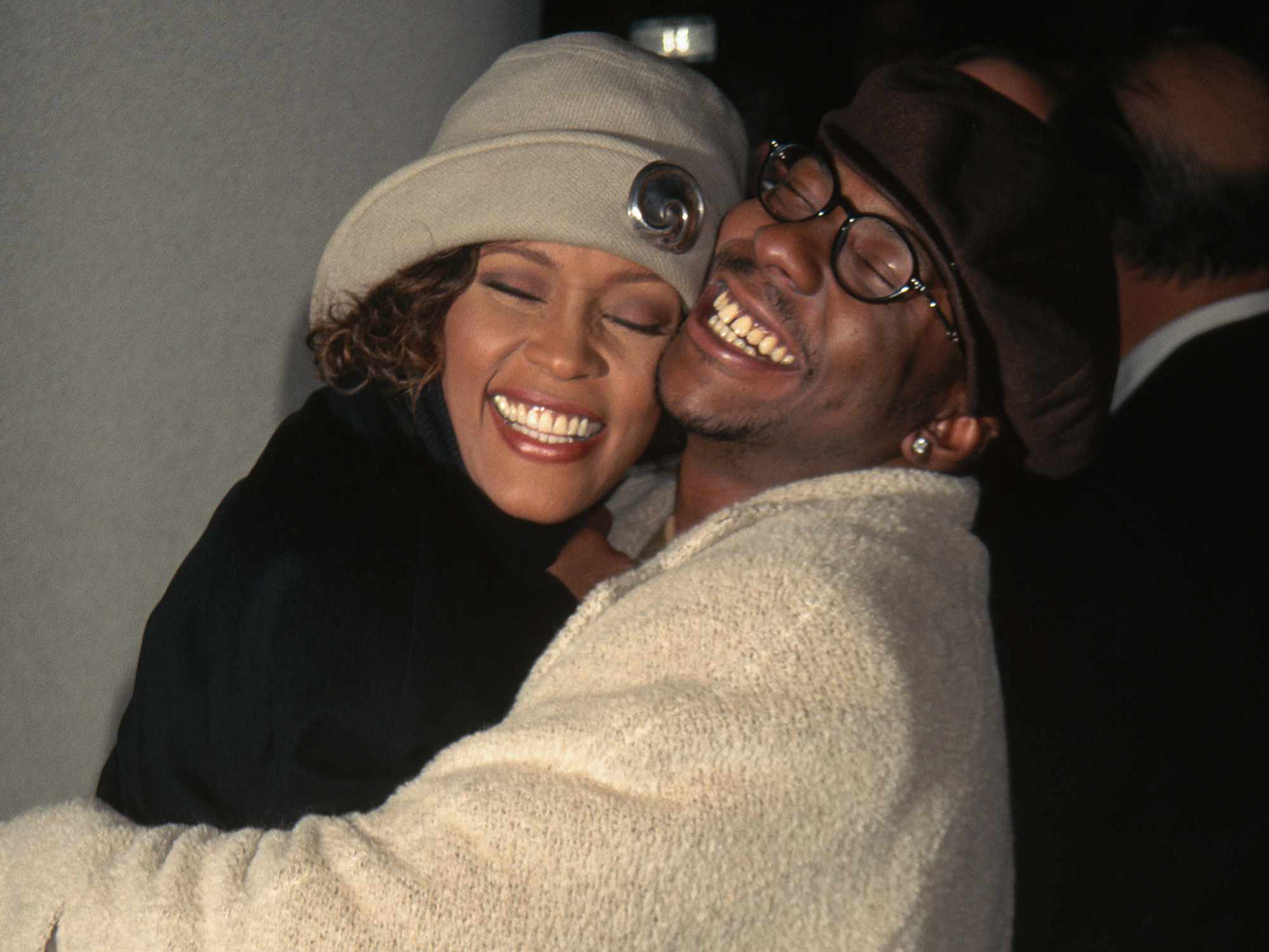 Bobby Brown and Whitney Houston at the premiere of "Cinderella" at Sony Lincoln Square Theater