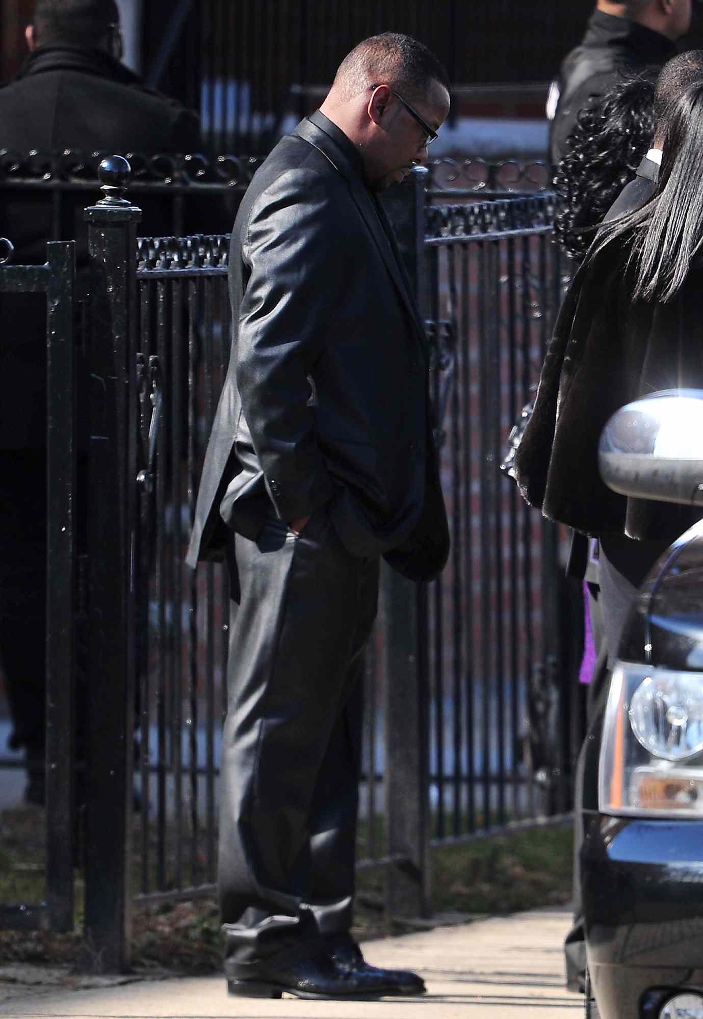 Bobby Brown stands outside of the funeral service for Whitney Houston on February 18, 2012 in Newark, New Jersey. Whitney Houston was found dead in her hotel room at The Beverly Hilton hotel on February 11, 2012
