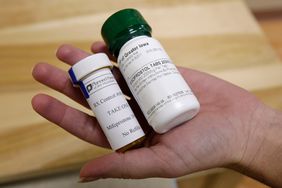 Bottles of abortion pills mifepristone, left, and misoprostol, right, at a clinic in Des Moines, Iowa, Sept. 22, 2010. A federal appeals court has preserved access to an abortion drug for now but under tighter rules that would allow the drug only to be dispensed up to seven weeks, not 10, and not by mail. (