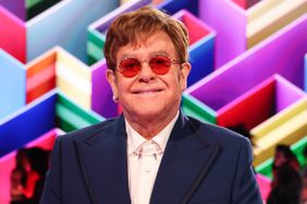 Sir Elton John poses during The BRIT Awards 