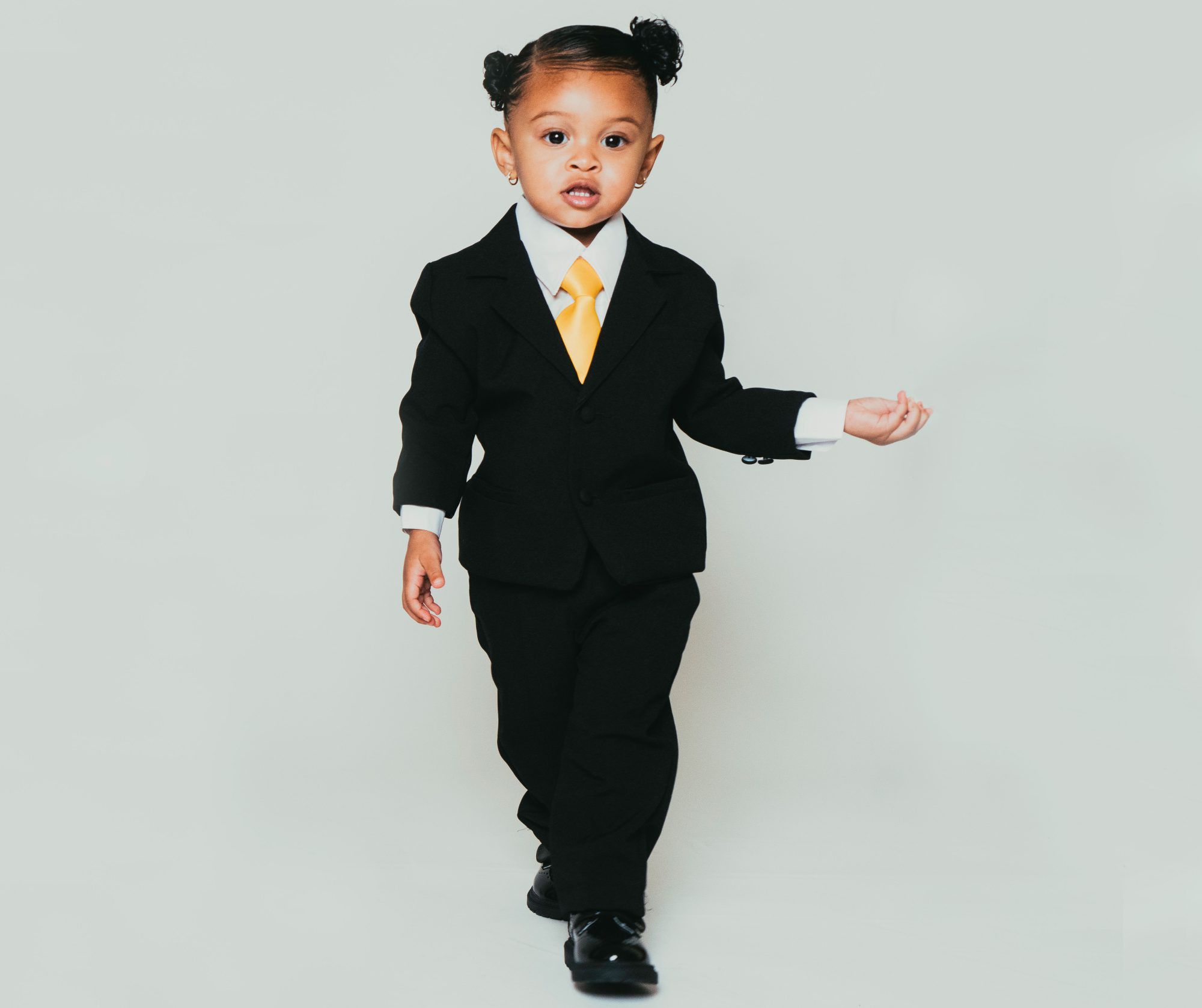 Usher Shares Photos of 'Lil Bosses' Sovereign and Sire in Suits Celebrating Their Birthdays. photo credit Bellamy Brewster