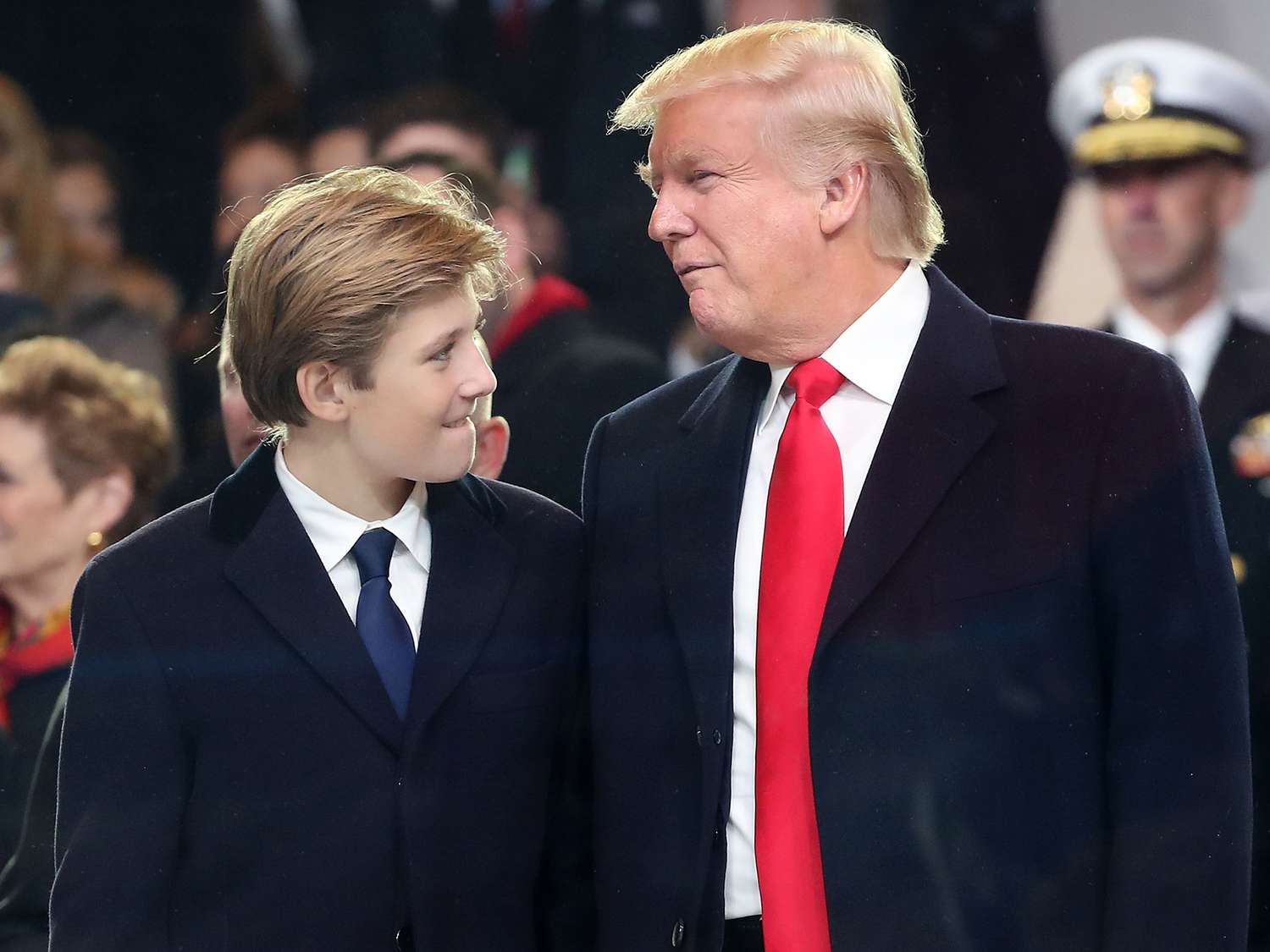 U.S. President Donald Trump stands with his son Barron Trump