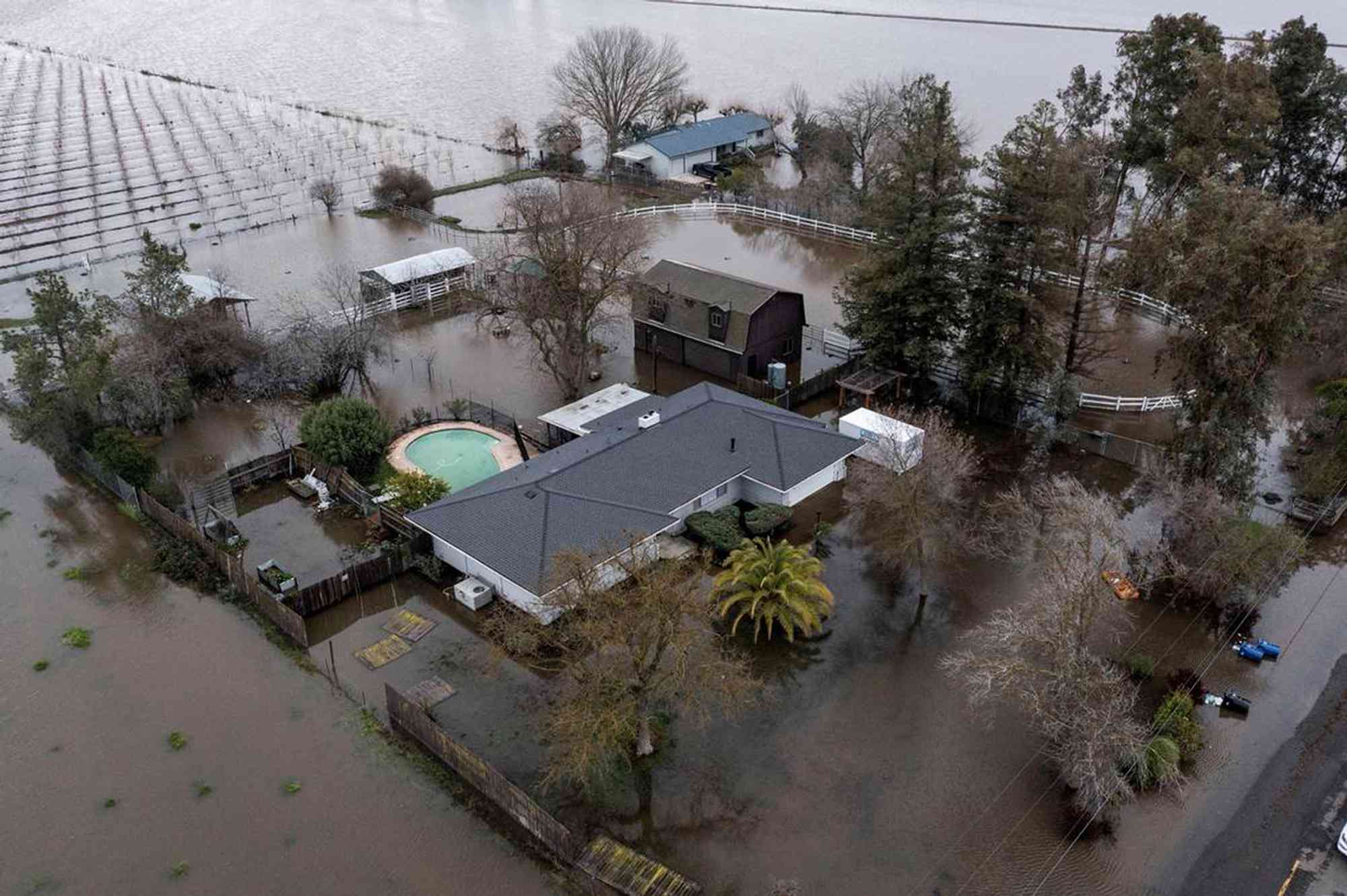 January 2, 2023, Sacramento County, California, USA: Flooded homes are seen in Point Pleasant, California, on Monday, as an evacuation order for residents in Point Pleasant and a shelter-in-place order for those in Wilton remained in effect. A historic atmospheric river dumped a deluge of rain across Northern California in the final days of 2022. The Cosumnes River swelled to its highest level ever in history on Sunday and parts of Sacramento County flooded.