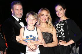 John Travolta and his wife Kelly Preston, daughter Ella Blue Travolta (R) and son Benjamin Travolta during the party in Honour of John Travolta's receipt of the Inaugural Variety Cinema Icon Award during the 71st annual Cannes Film Festival at Hotel du Cap-Eden-Roc on May 15, 2018 in Cap d'Antibes, France.