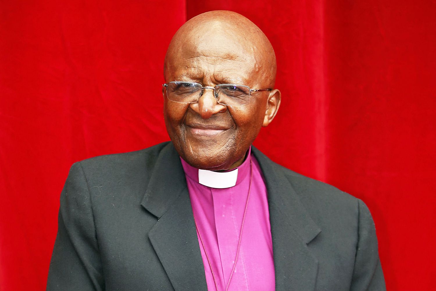 South African Archbishop and Nobel peace laureate Desmond Tutu poses as he arrives for a photocall for the documentary "Children of the Light" as part of the 54st Monte-Carlo Television Festival on June 8, 2014 in Monaco.