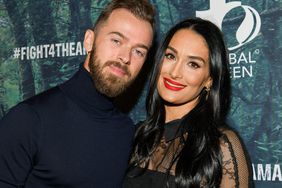 Artem Chigvintsev (L) and Nikki Bella attend the PUBG Mobile's #FIGHT4THEAMAZON Event at Avalon Hollywood on December 09, 2019 in Los Angeles, California