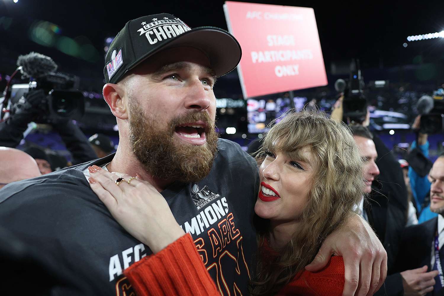 BALTIMORE, MARYLAND - JANUARY 28: Travis Kelce #87 of the Kansas City Chiefs celebrates with Taylor Swift after a 17-10 victory against the Baltimore Ravens in the AFC Championship Game at M&T Bank Stadium on January 28, 2024 in Baltimore, Maryland. 