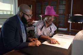 WHO DO YOU THINK YOU ARE? -- "Billy Porter" Episode 806 -- Pictured: (l-r) Dr. Christopher Bonner, Historian of University of Maryland, College Park, Billy Porter -- (Photo by: Harris Khan/NBC)