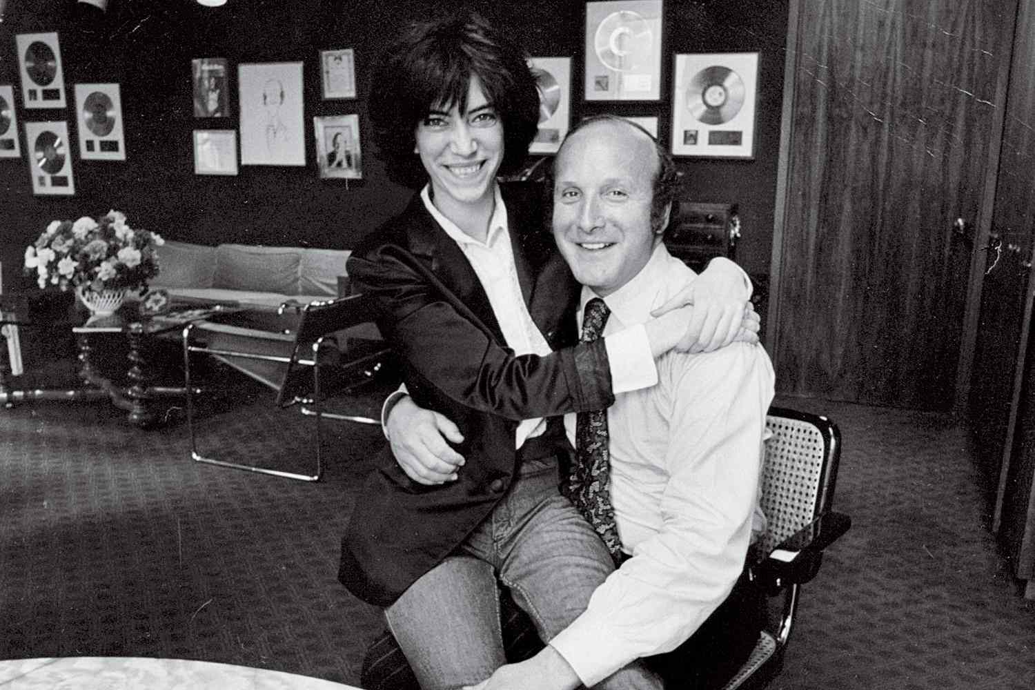 Clive Davis at his office April 1975 with Patti Smith Credit Clive Davis personal collection Emily Bender DKC Public Relations, Marketing & Government Affairs 261 Fifth Avenue, New York, NY 10016 T: (212) 981-5260 F: (212) 981-5460 emily_bender@dkcnews.com