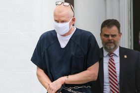 Alex Murdaugh is escorted out of the Colleton County Courthouse in Walterboro, S.C., on July 20, 2022. Murdaugh's trial on two counts of murder in the June 2021 deaths of his wife and son is scheduled to start Monday, Jan. 23, 2023.