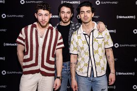 Nick Jonas, Kevin Jonas and Joe Jonas of the Jonas Brothers pose at the SiriusXM Miami Studios