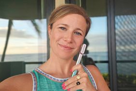 commerce director erin johnson poses with solawave skincare wand