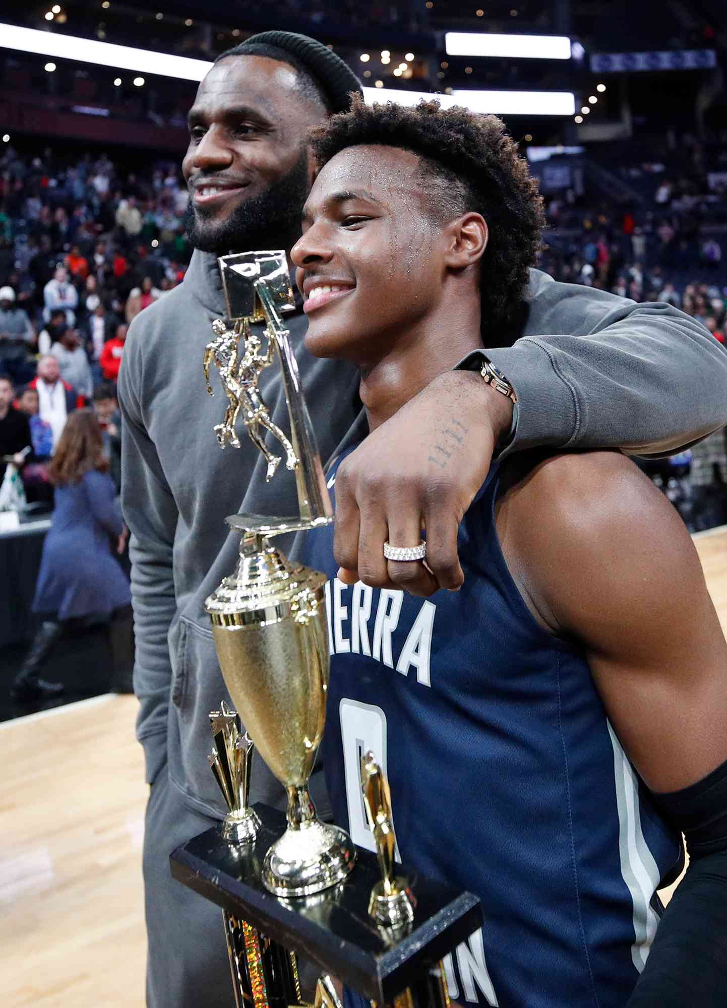 LeBron 'Bronny' James Jr. #0 of Sierra Canyon High School with his father LeBron James of the Los Angeles Lakers