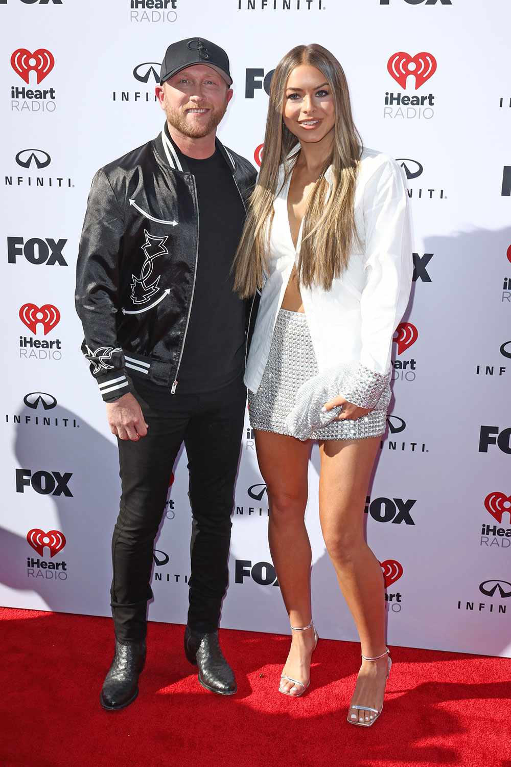 LOS ANGELES, CALIFORNIA - MARCH 27: (FOR EDITORIAL USE ONLY) (L-R) Cole Swindell and Courtney Little attend the 2023 iHeartRadio Music Awards at Dolby Theatre in Los Angeles, California on March 27, 2023. Broadcasted live on FOX. (Photo by Joe Scarnici/Getty Images for iHeartRadio)