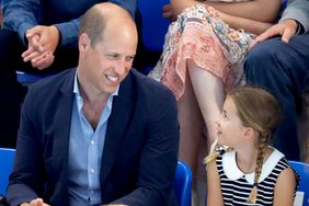Prince William, Duke of Cambridge and Princess Charlotte of Cambridge watch the swimming at the Sandwell Aquatics Centre during the 2022 Commonwealth Games on August 2, 2022 in Birmingham, England