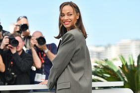 Zoe Saldana attends the Emilia Perez Photocall at the 77th annual Cannes Film Festival at Palais des Festivals on May 19, 2024 in Cannes, France. 