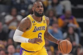  LeBron James #6 of the Los Angeles Lakers brings the ball upcourt against the Memphis Grizzlies during Game Five of the Western Conference First Round Playoffs at FedExForum on April 26, 2023