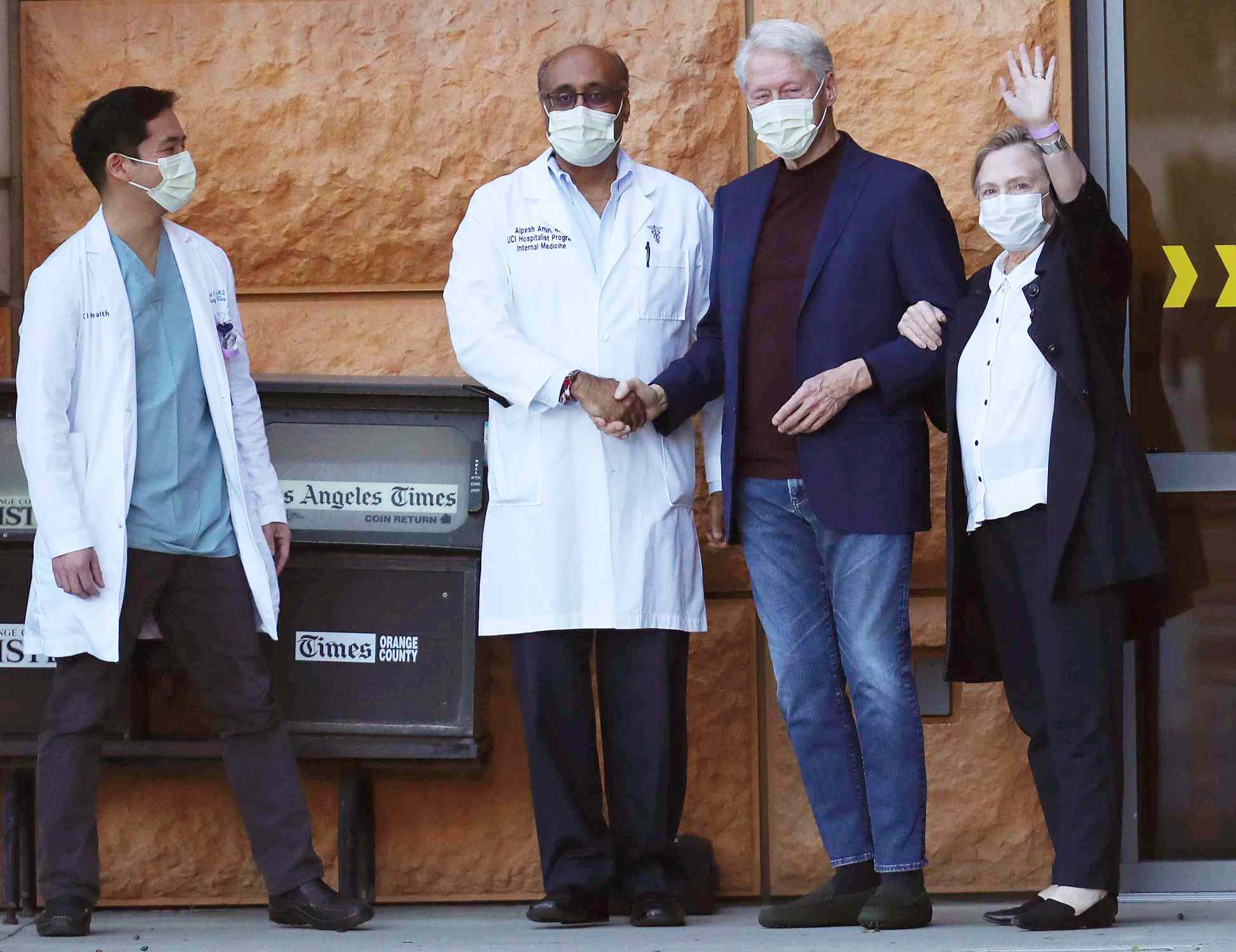 Former President Bill Clinton, standing with his wife, Hillary, was discharged from UC Irvine Medical Center Sunday morning, six days after he was admitted and treated for a urological and blood infection, Orange, California on October 17, 2021.