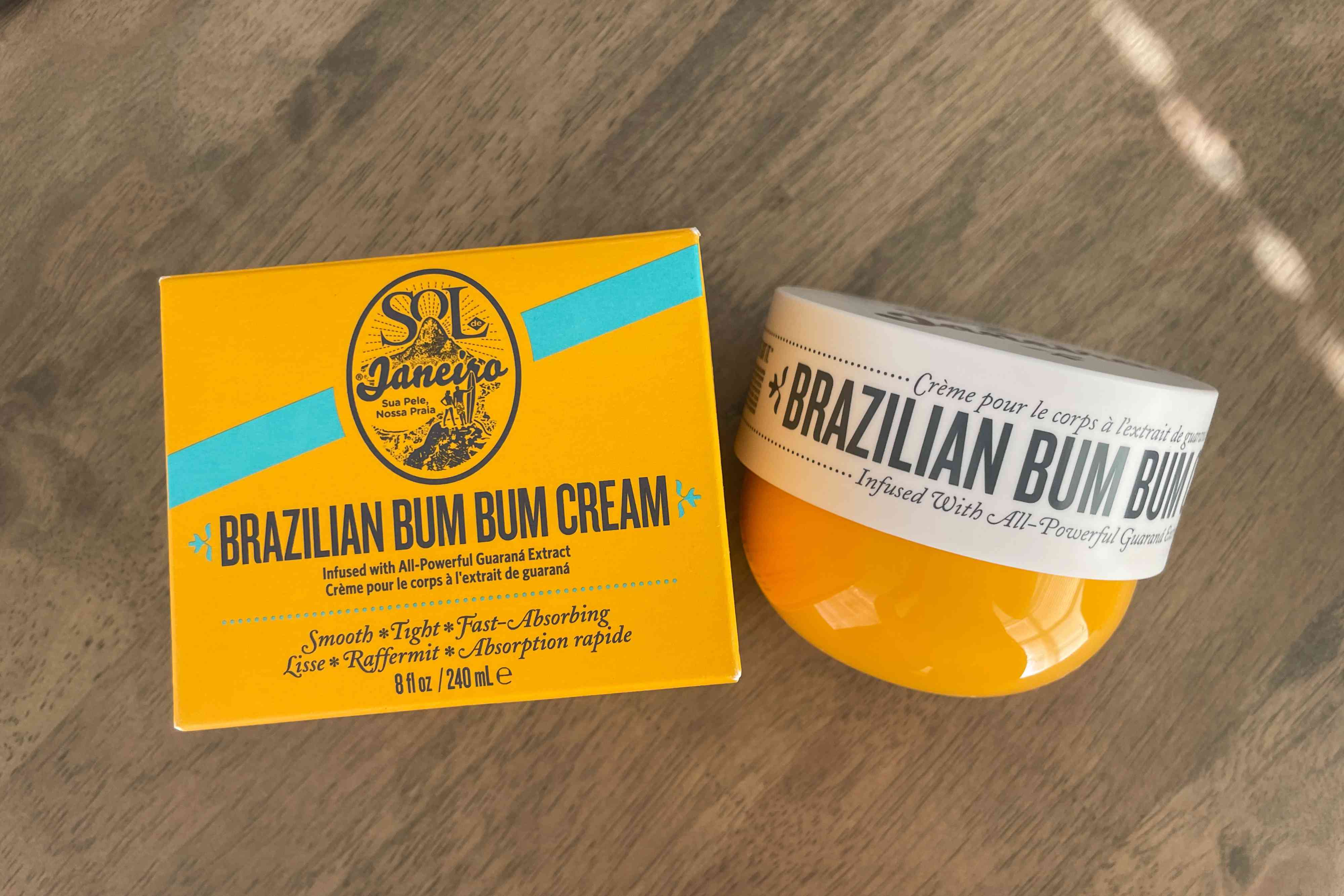 A jar of Sol de Janeiro Brazilian Bum Bum Cream next to its box