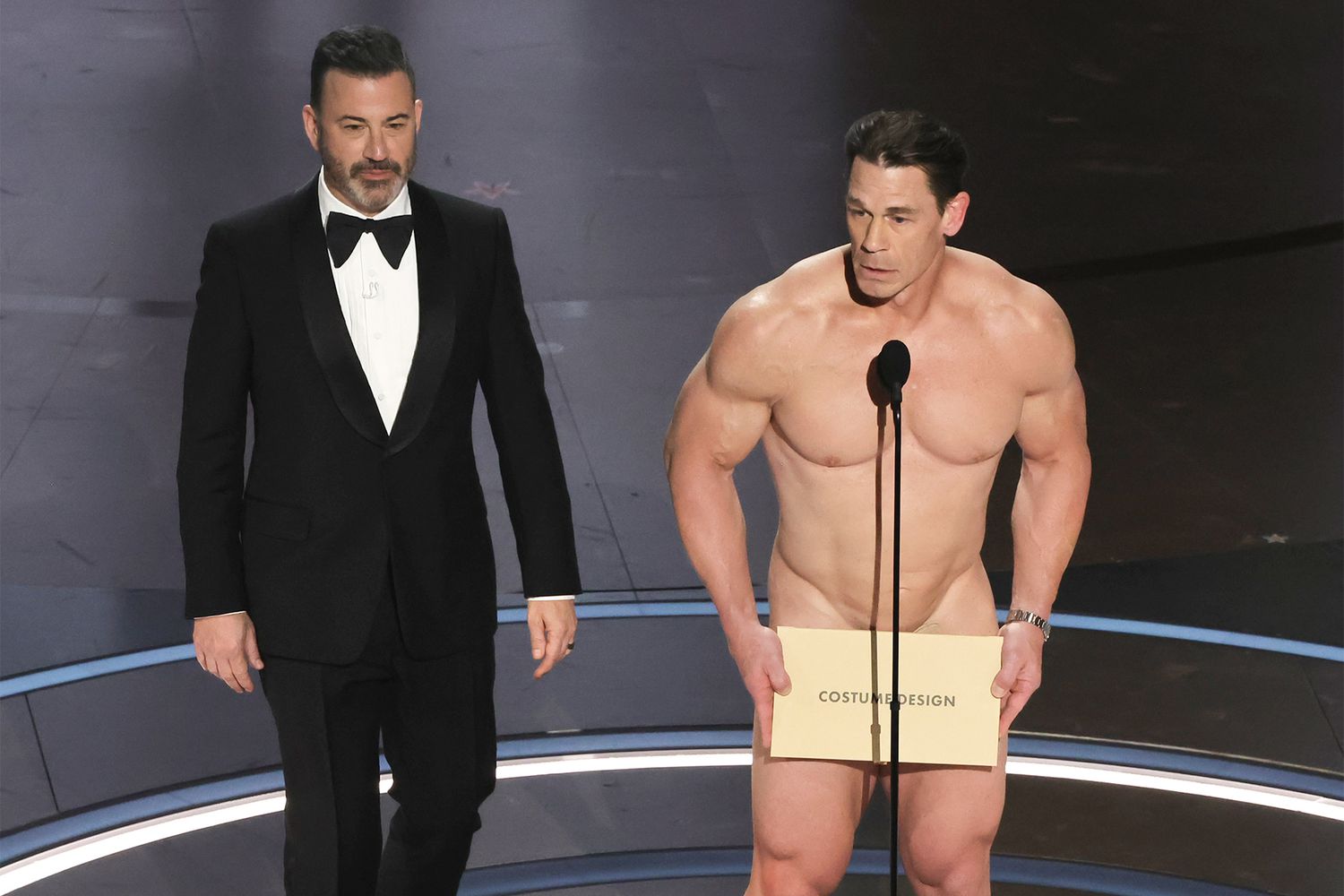 Jimmy Kimmel and John Cena speak onstage during the 96th Annual Academy Awards at Dolby Theatre on March 10, 2024 in Hollywood, California