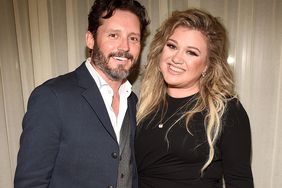 Brandon Blackstock and Kelly Clarkson backstage after she performed songs from her new album "The Meaning of Life" at The Rainbow Room on September 6, 2017 in New York City