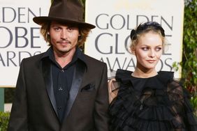Johnny Depp (L) and Girlfriend Vanessa Paradis attend the 61st Annual Golden Globe Awards at the Beverly Hilton Hotel on January 25, 2004 in Beverly Hills, California