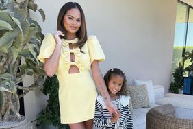 Chrissy Teigen daughter Luna yellow dress instagram 08 28 23