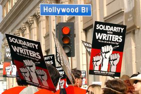 This November 20, 2007 photo shows demonstrators holding signs during the 20072008 Writers Guild of America strike in Hollywood. - Thousands of Hollywood television and movie writers will go on strike May 2, 2023, their union said, after talks with studios and streamers over pay and other conditions ended without a deal.