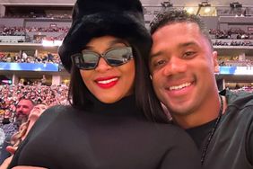 Russell Wilson Cradles Pregnant Wife Ciaraâs Bump in Sweet Snap 