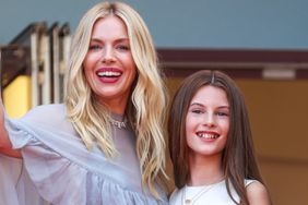 Sienna Miller and Marlowe Sturridge attend the "Horizon: An American Saga" Red Carpet at the 77th annual Cannes Film Festival at Palais des Festivals on May 19, 2024