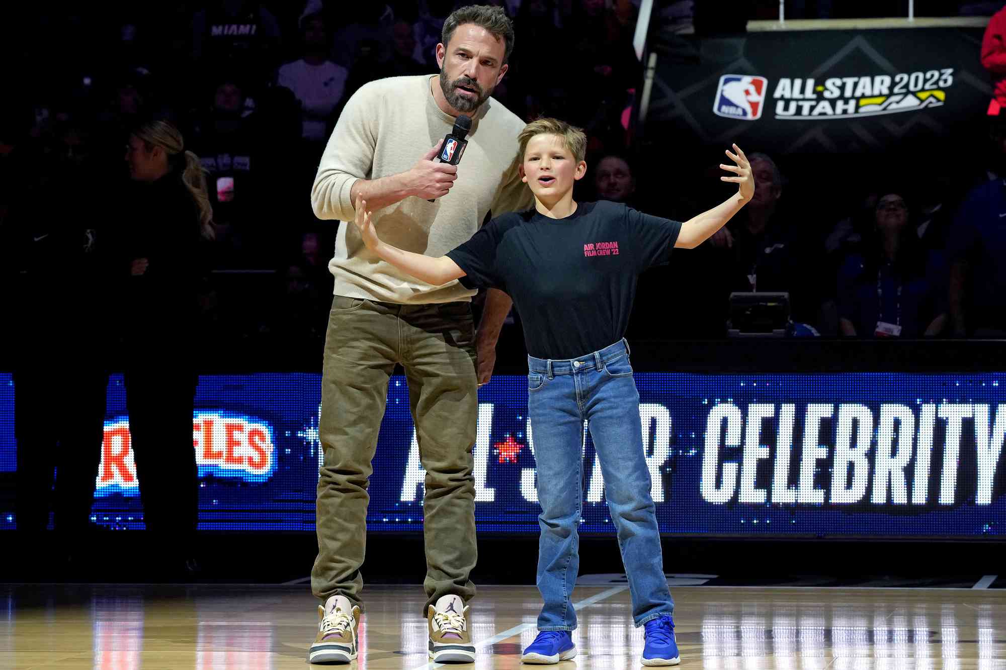 Ben Affleck and Samuel Garner Affleck speak at the Ruffles Celebrity Game during the 2023 NBA All-Star Weekend at Vivint Arena on February 17, 2023 in Salt Lake City, Utah.
