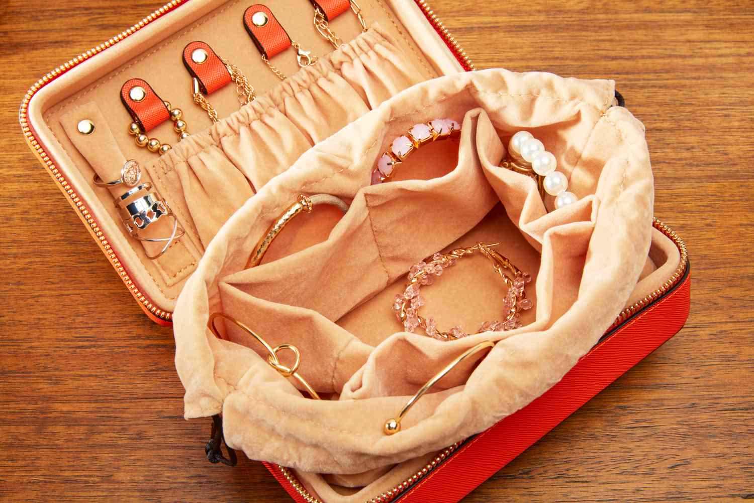 The Calpak Jewelry Case with jewelry inside