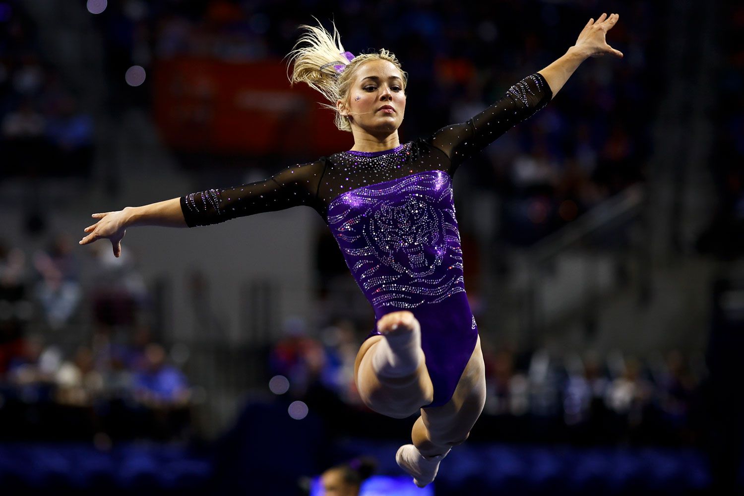 Olivia Dunne of the LSU Tigers competes during a meet against the Florida Gators at the Stephen C. O'Connell Center on February 23, 2024