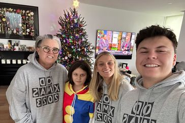 Rosie O'Donnell Poses with Her Kids in Front of the Christmas Tree as They Enjoy the Holiday Together