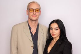 George Daniel and Charli XCX pose with the Visionary Award with Amazon Music, at the Ivor Novello Awards 2023 on May 18, 2023 in London, United Kingdom.