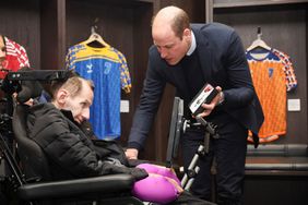 Prince William, Prince of Wales meets former rugby league player Rob Burrow to congratulate him for raising awareness of Motor Neurone Disease, during his visit to the Headingley Stadium 
