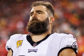 Jason Kelce of the Philadelphia Eagles looks on from the sideline before an NFL football game against the Kansas City Chiefs